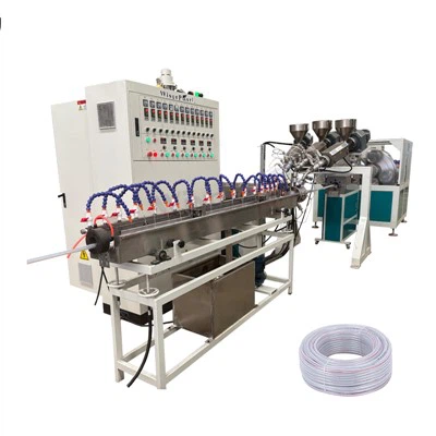 Stroj na hadice vyztužený PVC vlákny